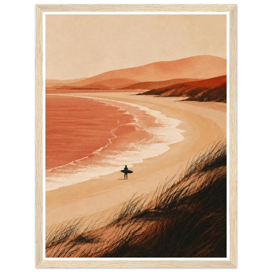 Lone surfer on a sandy beach beside coral waves and terracotta dunes in a natural wood frame.