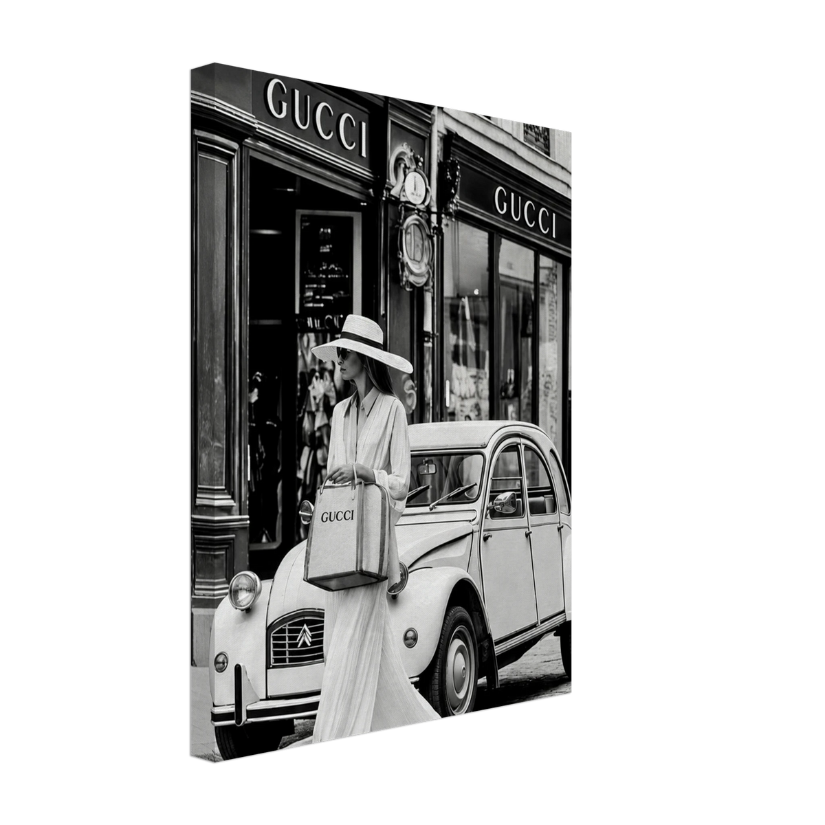 Woman in a sunhat walking past a vintage car outside a boutique in black and white printed on canvas.