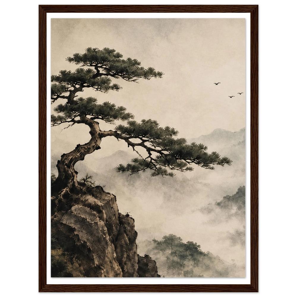 Pine tree reaching from a rocky cliff above misty mountains with birds in the sky in a dark wood frame.
