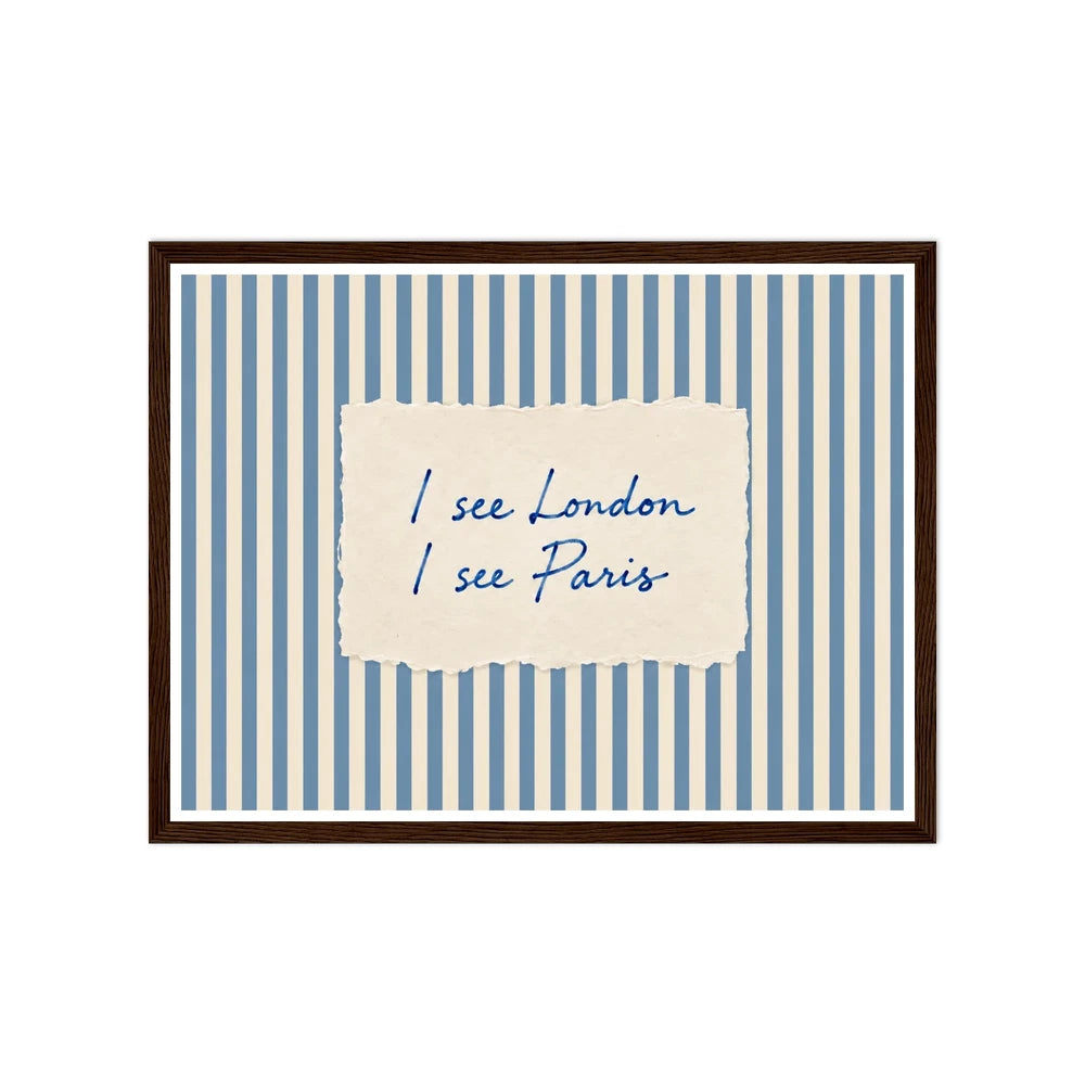 I see London / I see Paris quote on blue and cream stripes in a dark wood frame.
