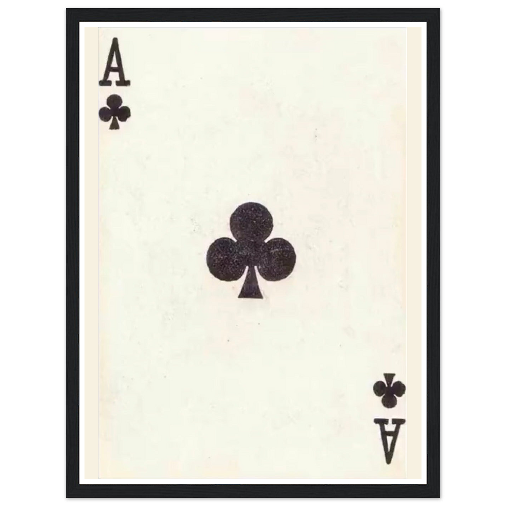 Black ace of clubs playing card on an aged cream background in a black frame.
