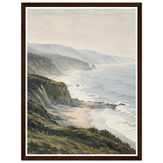 Green coastal cliffs and white surf beside a misty blue-grey sea in a dark wood frame.