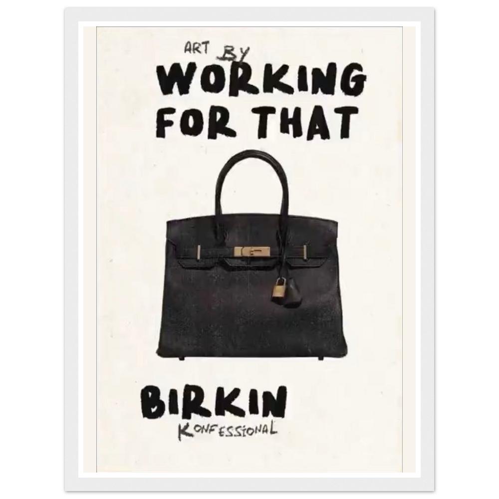 Black handbag beneath bold Working for that lettering on cream in a white frame.