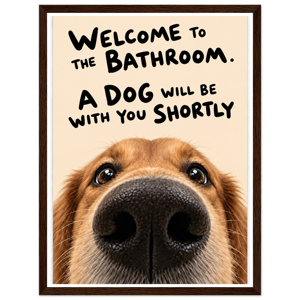 Golden-brown dog with the quote Welcome to the bathroom. A dog will be with you shortly in a dark wood frame.