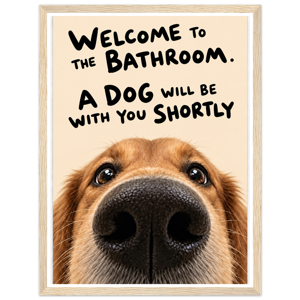 Golden-brown dog with the quote Welcome to the bathroom. A dog will be with you shortly in a natural wood frame.