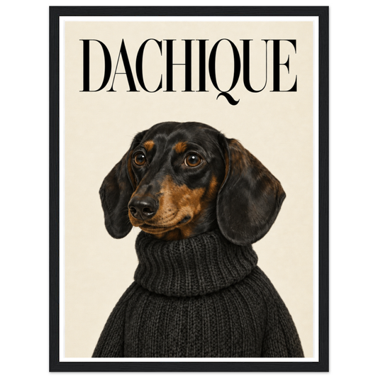 Black-and-tan dachshund in a dark knitted jumper beneath DACHIQUE lettering in a black frame.